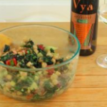A boeal of Kale salad made with Vya Extra Dry Vermouth Vinaigrette