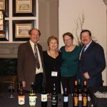 Andrew and Laurel Quady posing with two others for receiving the Honorary Winery of the Year Award at 2017 VinNEBRASKA