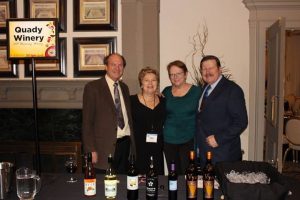 Andrew and Laurel Quady posing with two others for receiving the Honorary Winery of the Year Award at 2017 VinNEBRASKA