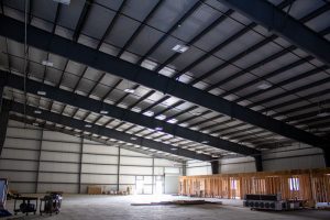 Inside Quady Winery's new warehouse with offices still under construction.