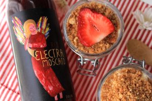 Red electra Moscato Bottle with No Bake Cheese Cake strawberries and flowers