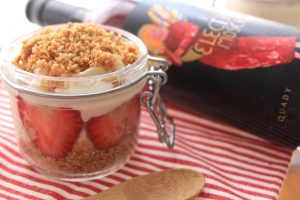 Cheesecake and strawberries in a canning jar with Red Electra Moscato