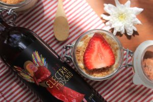 Red electra Moscato Bottle with No Bake Cheese Cake strawberries and flowers