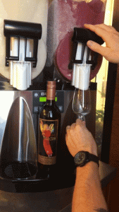 Gif of Quady Winery employee serving Red Electra Moscato slushie in a wine glass