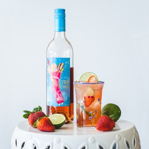 Electra Rosé Margarita with strawberries and limes