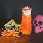 Electra Corn Candy Slushie paired with a skull and halloween candy