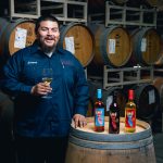 Jovonny Martinez at the barrel room with Electra wines