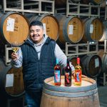 Alfonso Meza at the barrel room with Electra wines