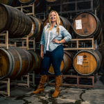 Quady winemaker Crystal Weaver-Kiessling in the barrel room at Quady Winery