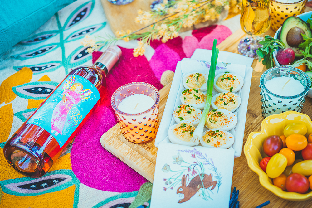 Deviled eggs with a bottle of Electra Moscato Rosé